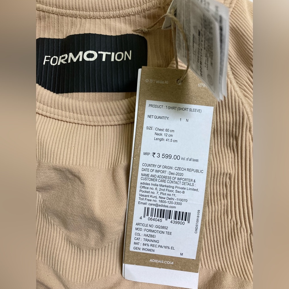 ADIDAS
Women Solid Round Neck Beige T-Shirt - Picture 8 of 9